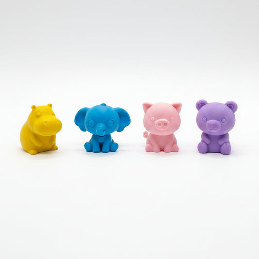 Three small colorful animal figurines
